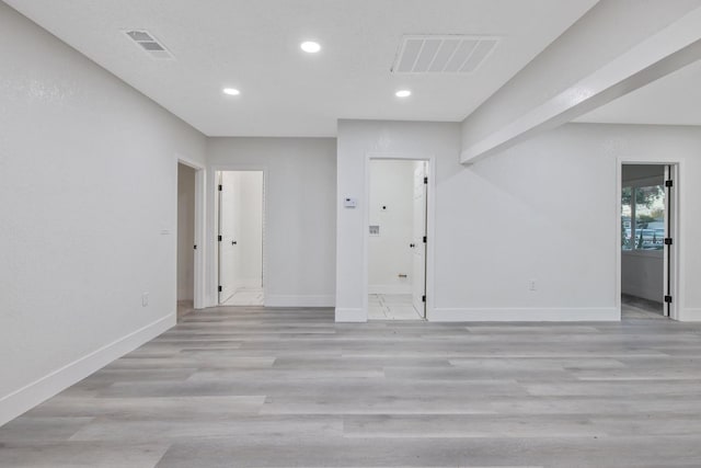 unfurnished room featuring light hardwood / wood-style flooring