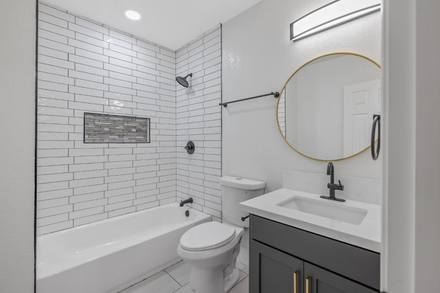 full bathroom with tile patterned floors, tiled shower / bath combo, toilet, and vanity