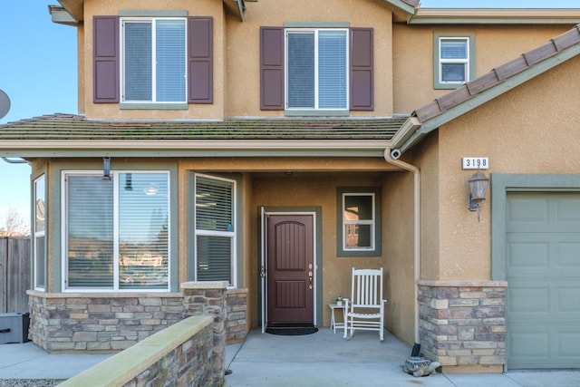 property entrance with a garage