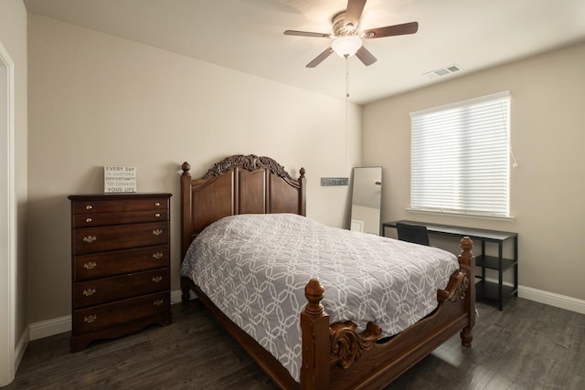 bedroom featuring ceiling fan and dark wood-type flooring