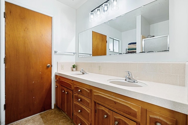 bathroom with backsplash and vanity