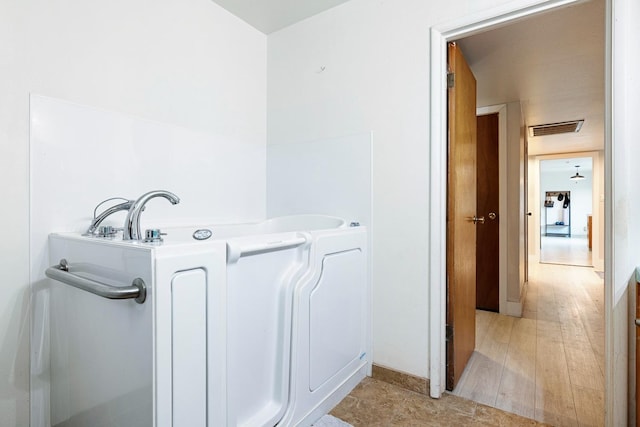 bathroom featuring hardwood / wood-style floors