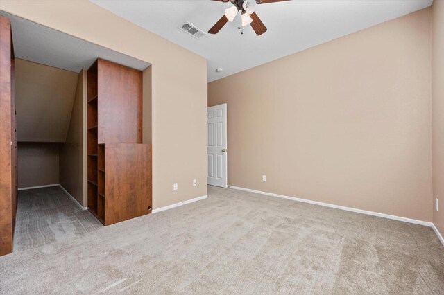 unfurnished bedroom featuring ceiling fan and light colored carpet