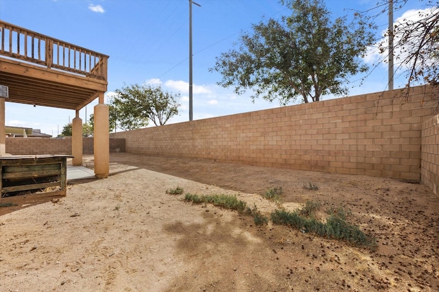 view of yard featuring a deck