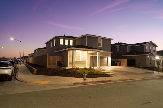 view of front of property featuring a garage