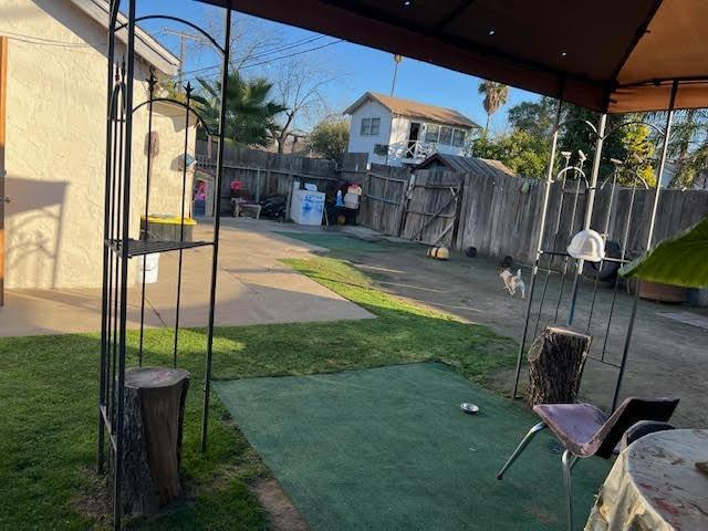 view of yard featuring a gazebo and a patio