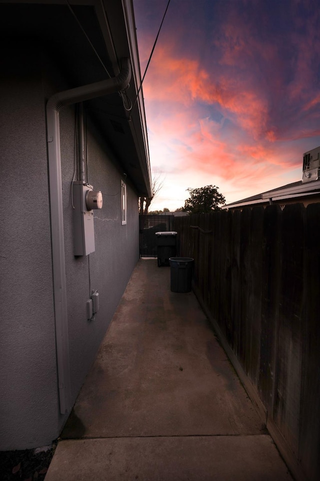 view of property exterior at dusk