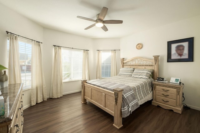 bedroom featuring ceiling fan and dark hardwood / wood-style flooring