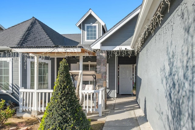 property entrance with a porch