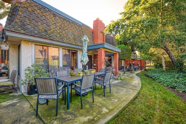 view of patio with outdoor dining space