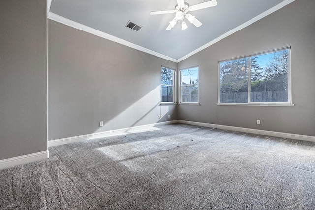 carpeted empty room with vaulted ceiling, ornamental molding, and ceiling fan