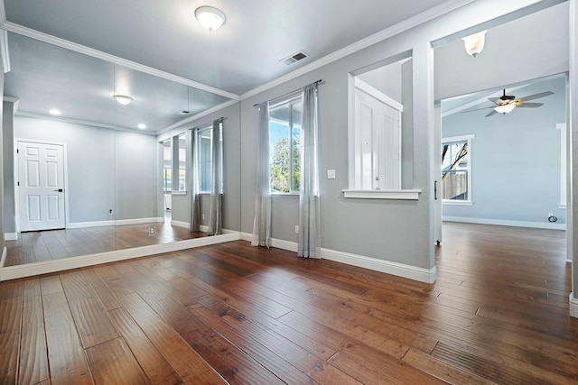 interior space with ornamental molding, dark hardwood / wood-style floors, and ceiling fan