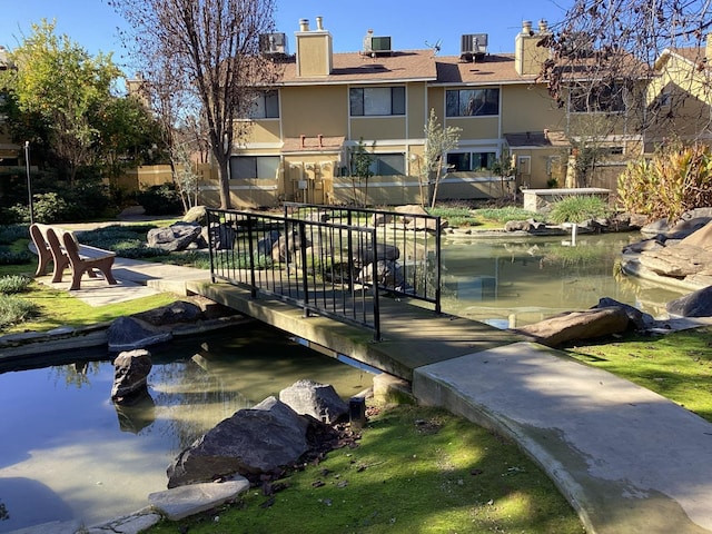 view of dock with central air condition unit