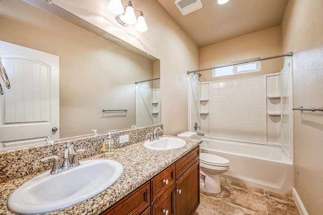 full bathroom featuring shower / tub combination, vanity, and toilet