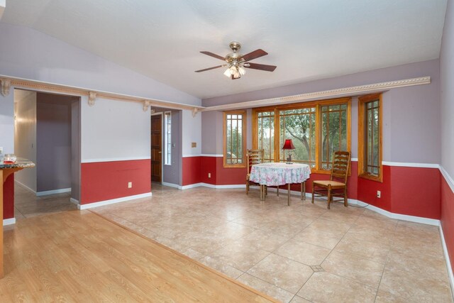 dining area with lofted ceiling and ceiling fan