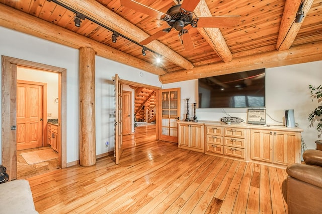 living room with wooden ceiling, track lighting, ceiling fan, light wood-type flooring, and beamed ceiling