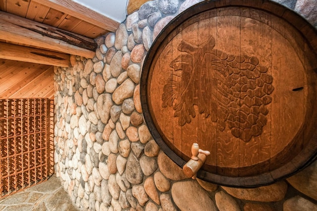 12755 Rusty Spur Ln, Clovis, CA 93619 - wine area featuring stone finish flooring and beamed ceiling