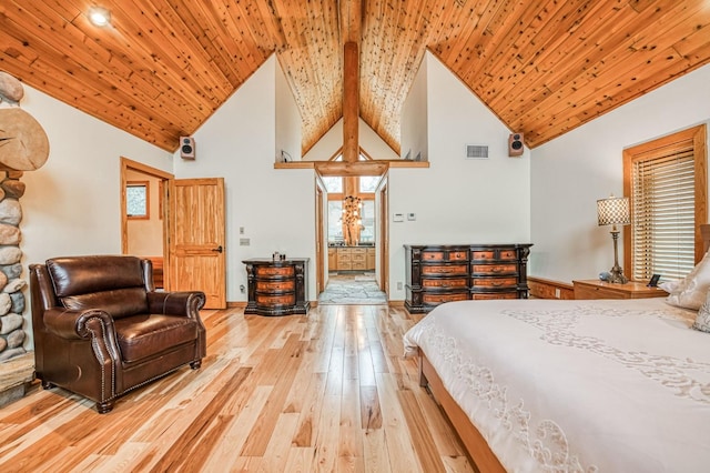 bedroom with hardwood / wood-style floors, high vaulted ceiling, and wood ceiling