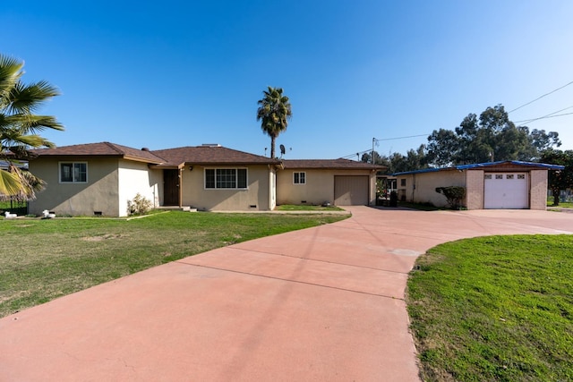 ranch-style house with a garage and a front yard