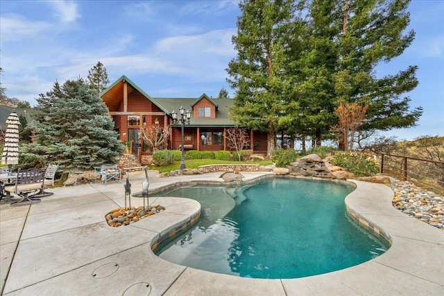 view of pool featuring a patio area