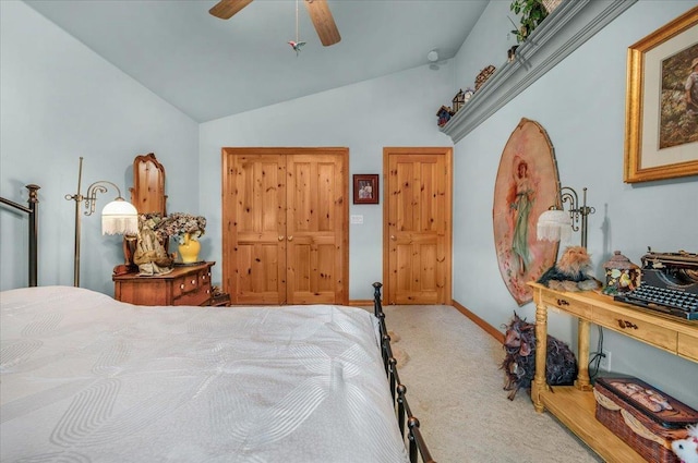 bedroom with carpet flooring, ceiling fan, and lofted ceiling