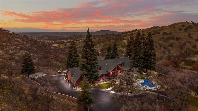 aerial view at dusk with a mountain view