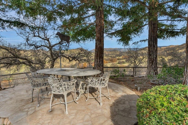 view of patio featuring a mountain view