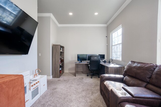 home office with light colored carpet and crown molding