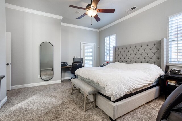 bedroom with carpet, ceiling fan, and ornamental molding