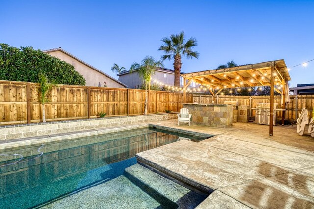 view of swimming pool featuring a grill