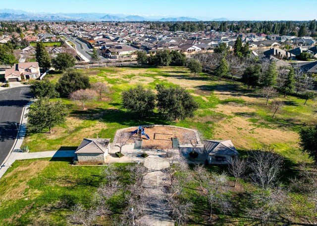 birds eye view of property featuring a mountain view