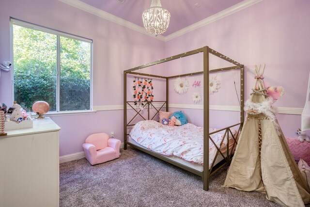 carpeted bedroom featuring a chandelier and crown molding