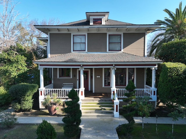 view of front of property featuring covered porch