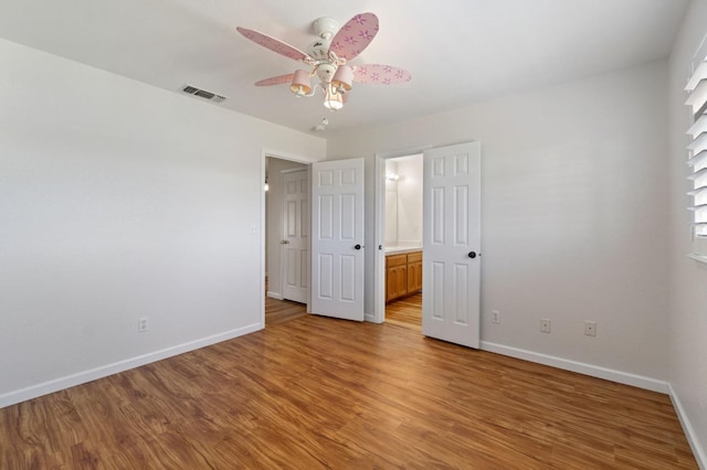 unfurnished bedroom featuring ceiling fan and light hardwood / wood-style flooring