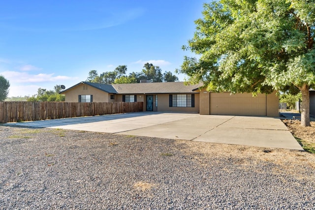 single story home with a garage