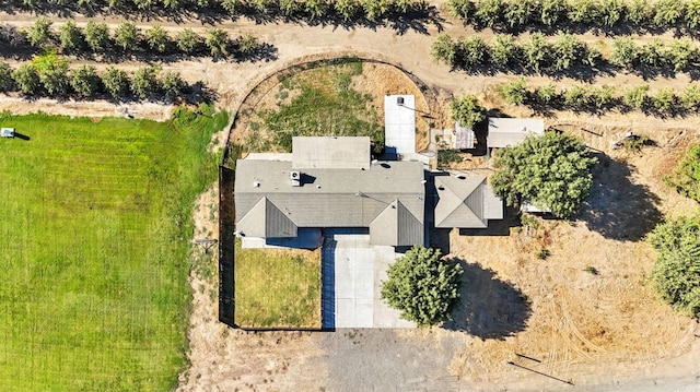 birds eye view of property featuring a rural view