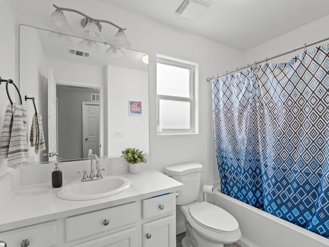 full bathroom with vanity, toilet, and shower / bathtub combination with curtain