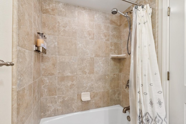 bathroom with shower / tub combo with curtain