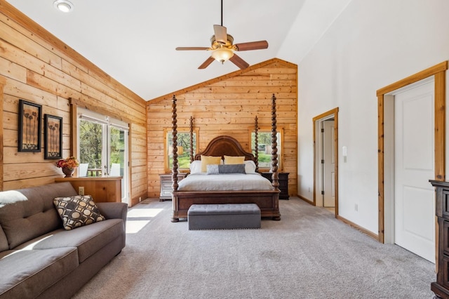 carpeted bedroom with ceiling fan, lofted ceiling, and wooden walls