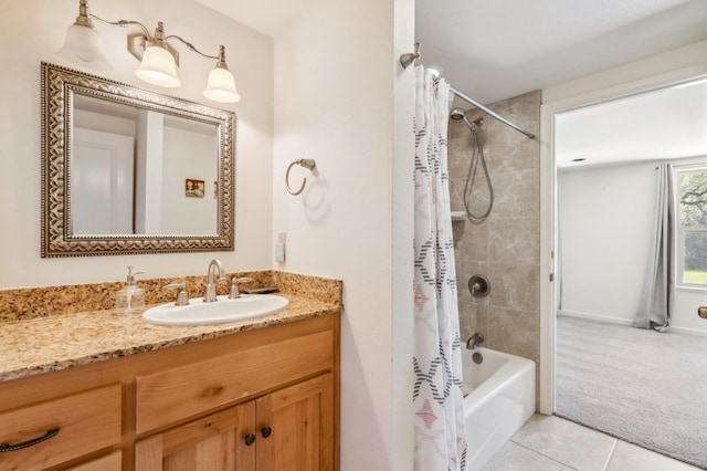 bathroom featuring tile patterned flooring, vanity, and shower / bath combination with curtain