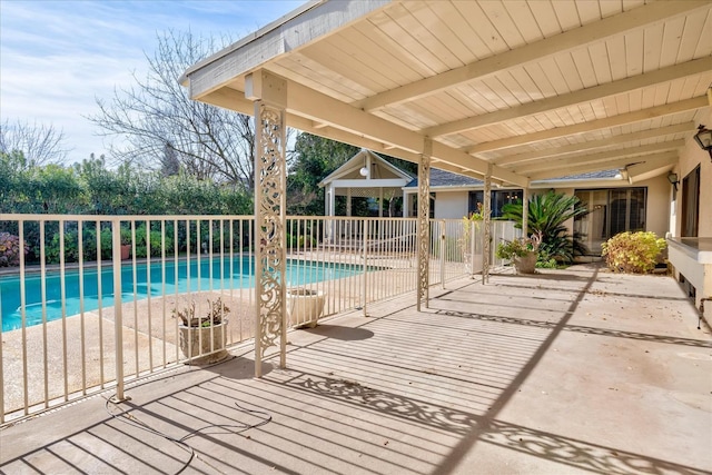 view of pool featuring a patio