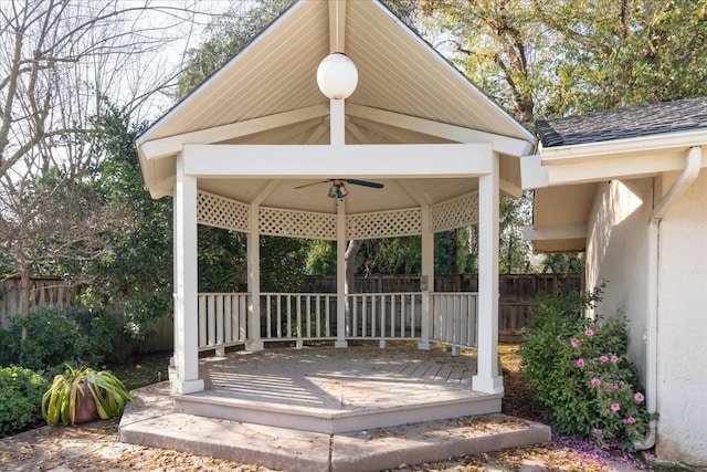 deck featuring a gazebo and ceiling fan