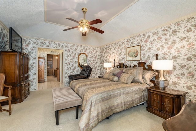 bedroom featuring a textured ceiling, light colored carpet, vaulted ceiling, ceiling fan, and crown molding