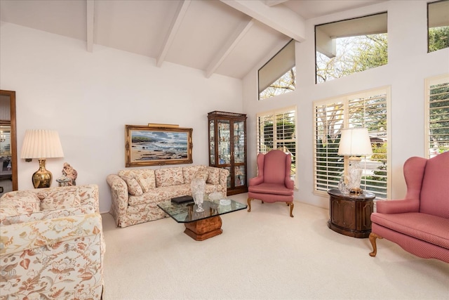 living room featuring carpet, beam ceiling, and high vaulted ceiling