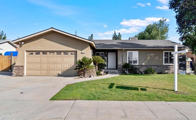 single story home featuring a front yard and a garage