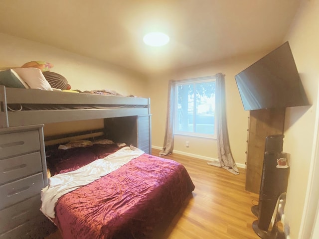 bedroom with light hardwood / wood-style flooring