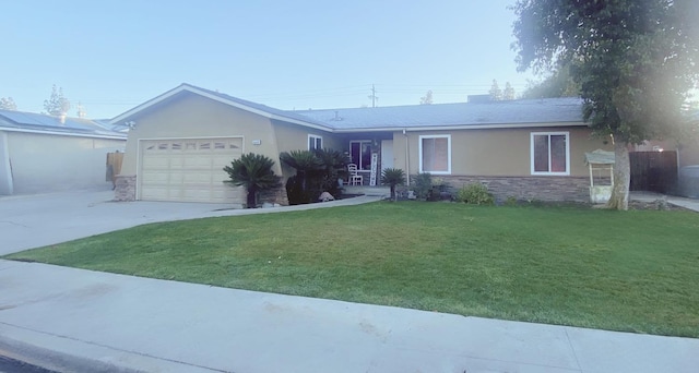 single story home with a garage and a front yard