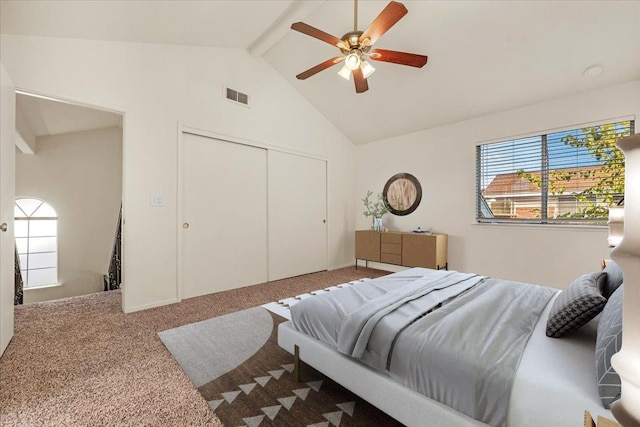 bedroom featuring multiple windows, ceiling fan, and light carpet