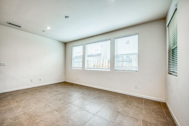 view of tiled spare room