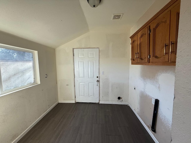 laundry room with cabinets, dark hardwood / wood-style floors, and hookup for an electric dryer